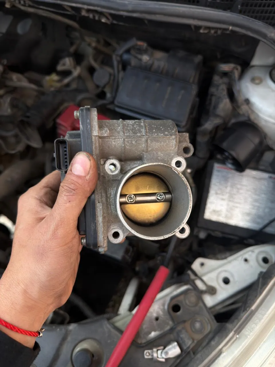 Cuerpo de aceleración Nissan Tiida limpio listo para calibración